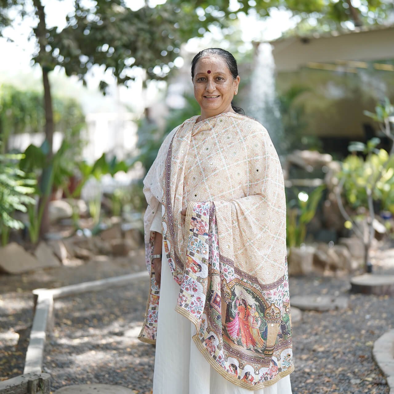 School Staff Member Portrait Standing Outdoors in Campus Garden Area