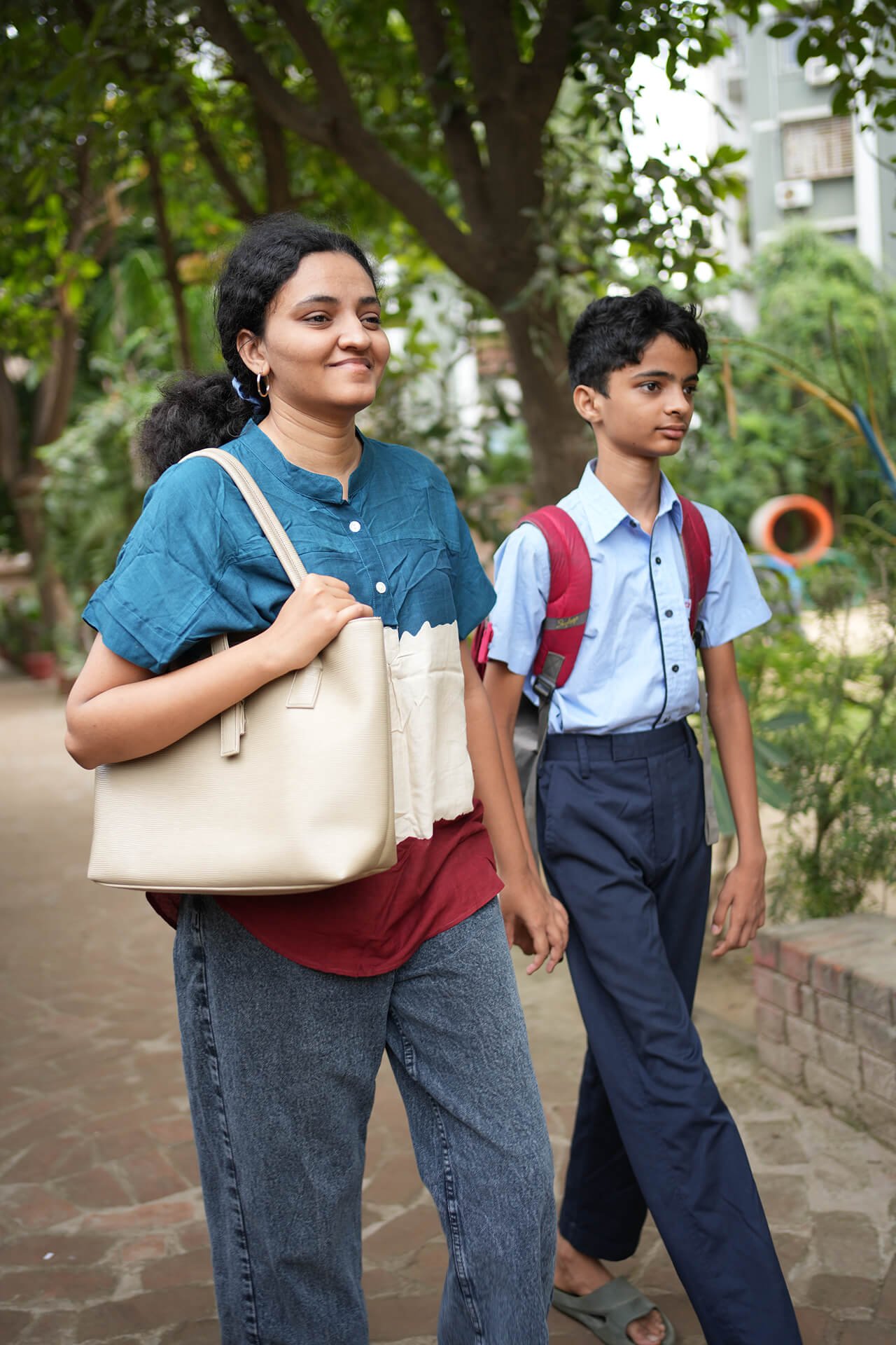 Mother and Son Walking Together Outdoors