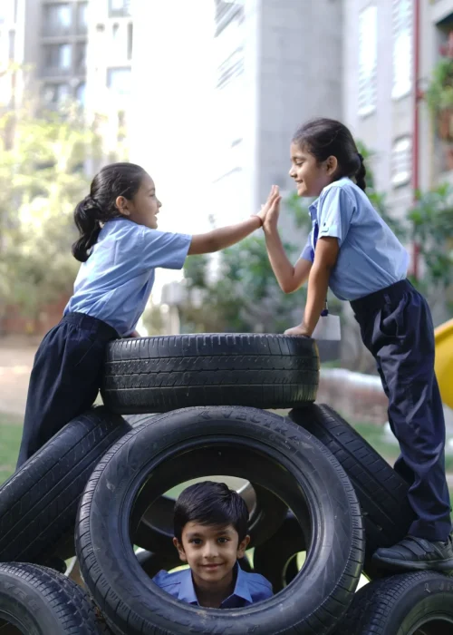 Children Playing on Tire